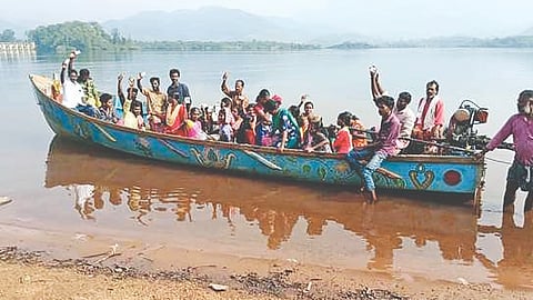 Kani tribals on a boat ride to cast votes in the 2024 LS polls
