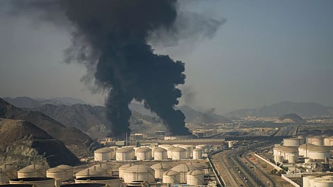 Fire and plumes of smoke rise from an oil facility in Fujairah, United Arab Emirates