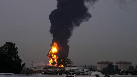 Iran hits Kuwaiti oil refinery and explosions boom over Tehran from Israeli attack