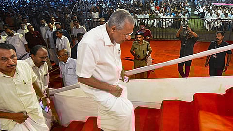 Kerala Chief Minister Pinarayi Vijayan arrives to address a rally, in Kozhikode