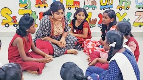 Sriprada Muralikrishnan teaching the children
