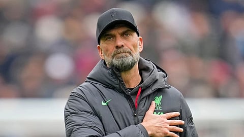 Liverpool’s manager Jurgen Klopp gestures to fans at the end of the English Premier League soccer match between West Ham United and Liverpool at London stadium in London