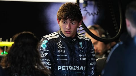 Mercedes driver Andrea Kimi Antonelli of Italy works with his team members in the garage in Suzuka, central Japan, Thursday, March 26, 2026, ahead of Sunday's Japanese Formula One Grand Prix race