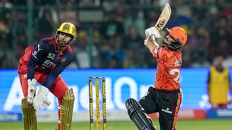 Sunrisers Hyderabad's captain Ishan Kishan plays a shot during an Indian Premier League (IPL) 2026 T20 cricket match between Royal Challengers Bengaluru and Sunrisers Hyderabad