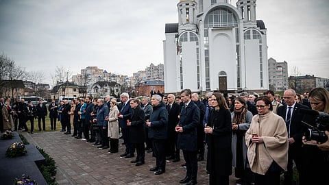 In this photo provided by the Ukrainian Foreign Ministry Press Office, High Representative of the European Union for Foreign Affairs and Security Policy Kaja Kallas, center left, Ukraine's Foreign Minister Andrii Sybiha, center right, and EU foreign ministers attend a commemorating ceremony in Bucha, Ukraine