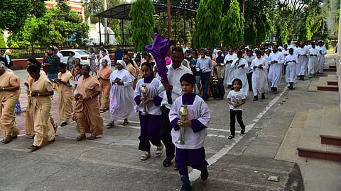 Members of the Christian community during a Good Friday procession, near St Joseph Cathedral Church, in Prayagraj, Uttar Pradesh, Friday, April 3, 2026