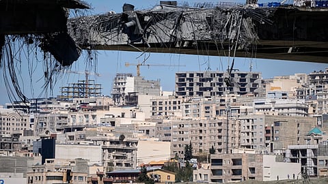 A bridge struck by U.S. airstrikes on Thursday is seen in the town of Karaj, west of Tehran, Iran, Friday, April 3, 2026.