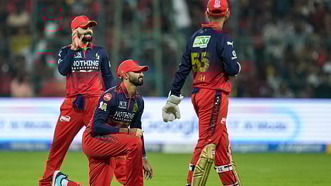 Bengaluru: From left, Royal Challengers Bengaluru's Virat Kohli, Devdutt Padikkal and wicketkeeper Jitesh Sharma during an Indian Premier League (IPL) 2026 T20 cricket match between Royal Challengers Bengaluru and Chennai Super Kings, in Bengaluru
