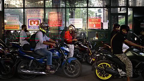 Motorists queue up outside a fuel pump in Dhaka, as Bangladesh tries to handle its energy crisis related to the Iran war