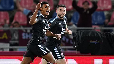 Aston Villa's Ollie Watkins, left, celebrates scoring during the Europa League soccer match between Bologna and Aston Villa in Bologna, Italy