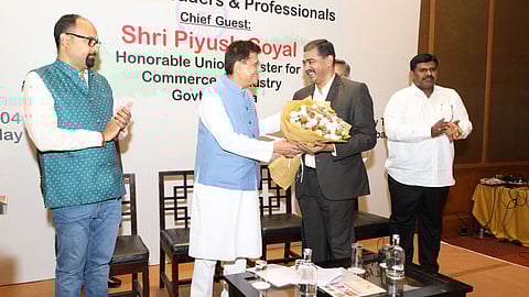 Union Minister Piyush Goyal being greeted at the interactive session of industrial bodies in Coimbatore on Friday