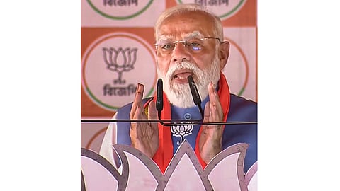 Prime Minister Narendra Modi speaks before a public rally ahead of the West Bengal Assembly elections, in Purba Bardhaman, West Bengal