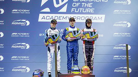 Indian racer Atiqa Mir, right, poses on the podium after finishing third in the final of Round 1 of the Champions of the Future Academy karting series at the Lucas Guerrero Circuit, in Valencia, Spain. Atiqa Mir became the first Indian to secure a podium finish in the European leg of the series