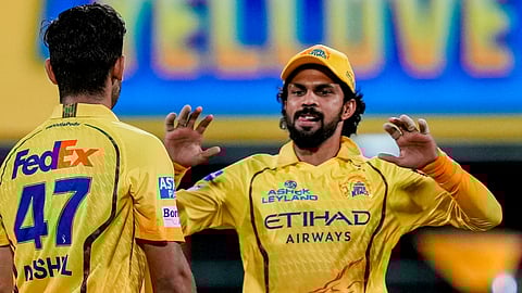 Chennai Super Kings' Anshul Kamboj, left, with captain Ruturaj Gaikwad celebrates after the taking the wicket of Kolkata Knight Riders' Finn Allen during the Indian Premier League (IPL) 2026 T20 cricket match between Chennai Super Kings and Kolkata Knight Riders, at MA Chidambaram Stadium in Chennai, Tamil Nadu, Tuesday, April 14, 2026