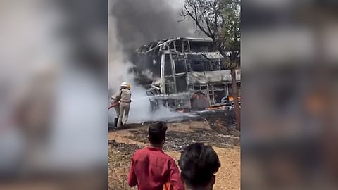 Rescue operation underway as flames and smoke billow from a bus after a car allegedly collides head-on with it, in Yadgir, Karnataka