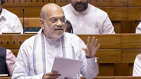 Union Home Minister Amit Shah speaks in the Lok Sabha during the Special session of Parliament