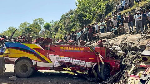 Wrecked remains of a passenger bus after it rolled down a hill, in Jammu and Kashmir's Udhampur district