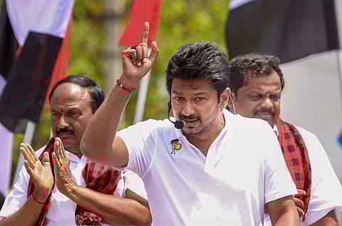 Tamil Nadu Deputy Chief Minister and DMK Youth Wing Secretary Udhayanidhi Stalin, centre, addresses an election campaign in support of party candidates for Gobichettipalayam and Anthiyur constituencies, N Nallasivam, left, and M Sivabalan, right, respectively, ahead of the state assembly elections, in Erode district