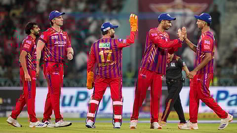 Lucknow Super Giants' Mohsin Khan celebrates with teammates after taking a catch of Rajasthan Royals Donovan Ferreira during an Indian Premier League (IPL) 2026 T20 cricket match between Lucknow Super Giants and Rajasthan Royals, in Lucknow, Uttar Pradesh, Wednesday, April 22, 2026.