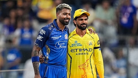 Mumbai Indians' captain Hardik Pandya, left, with Chennai Super Kings' captain Ruturaj Gaikwad during the toss before an Indian Premier League (IPL) 2026 T20 cricket match between Mumbai Indians and Chennai Super Kings