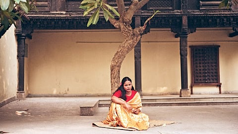 A model in a Banarasi saree
