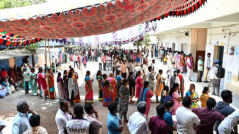 Voters at a polling booth in Chennai