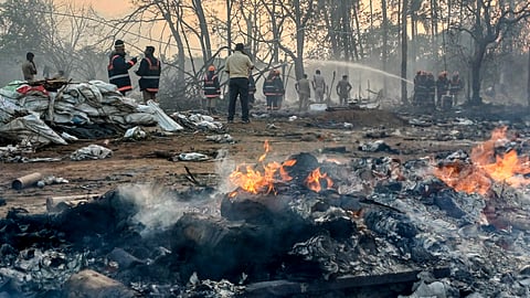 Firefighters containing fire at the manufacturing unit