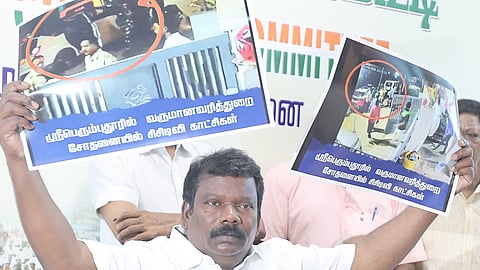 TNCC chief Selvaperunthagai displays screen grabs at Satyamurthy Bhavan in Chennai on Friday