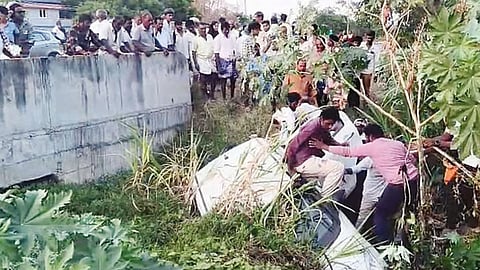 Car plunges into stream