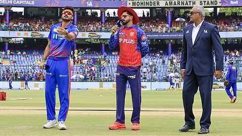 DC skipper Axar Patel with PBKS captain Shreyas Iyer during the toss in Arun Jaitley stadium in New Delhi.