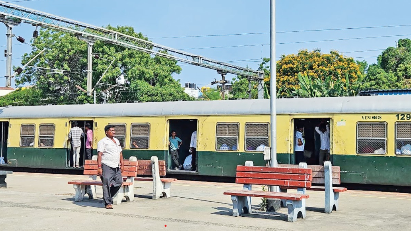 A passenger walking on the platform exposed to scorching
sun due to inadequate roofing in Chetpet railway station