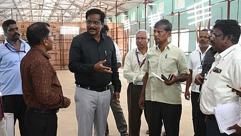 District Electoral Officer K Tharpagaraj inspecting arrangements at a vote counting centre in Tiruvannamalai