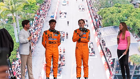McLaren drivers Oscar Piastri, center right, of Australia, and Lando Norris of Britain