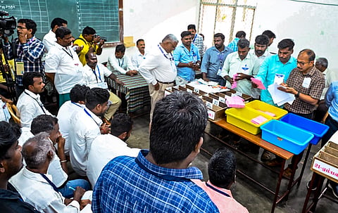 Puducherry: Poll officials during the counting of votes for the Puducherry Assembly elections at a counting centre, in Puducherry, Monday, May 4, 2026.