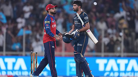 Gujarat Titans' Washington Sundar shakes hands with Punjab Kings' captain Shreyas Iyer following their win during the Indian Premier League cricket match between Gujarat Titans and Punjab Kings in Ahmedabad, India, Sunday, May 3, 2026