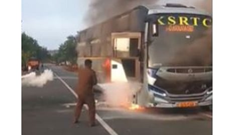 A KSRTC bus engulfed in fire on the Karnataka State Highway