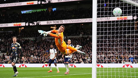 Tottenham Hotspur's Mathys Tel scores during the English Premier League soccer match between Tottenham Hotspur and Leeds United in London