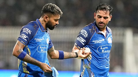 Mumbai Indians' captain Hardik Pandya, left, and Deepak Chahar during the Indian Premier League (IPL) 2026 T20 cricket match between Kolkata Knight Riders and Mumbai Indians, in Kolkata, West Bengal, Wednesday, May 20, 2026.