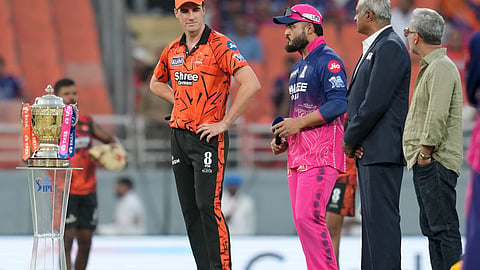 Rajasthan Royals' captain Riyan Parag, second left, and Sunrisers Hyderabad's captain Pat Cummins, left, with others during the toss before the Indian Premier League (IPL) 2026 Eliminator T20 cricket match between Rajasthan Royals and Sunrisers Hyderabad, in New Chandigarh, Wednesday, May 27, 2026