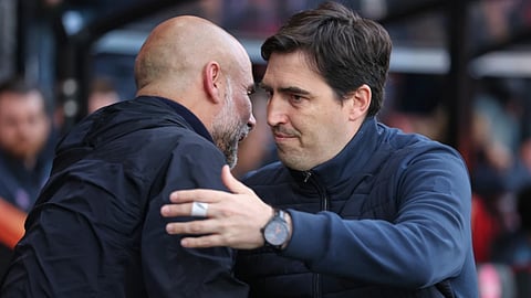 Manchester City's head coach Pep Guardiola, left, greets Bournemouth's head coach Andoni Iraola before the English Premier League soccer match between AFC Bournemouth and Manchester City in Bournemouth, England
