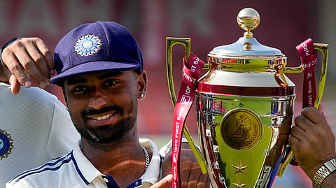 Mullanpur: India's Manav Suthar with the match trophy after winning the Test cricket match between India and Afghanistan, in Mullanpur, Monday, June 8, 2026.