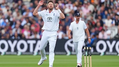 England’s Ollie Robinson reacts after bowling a delivery during the fourth day of the Test match between England and New Zealand at Lord’s cricket ground in Londo