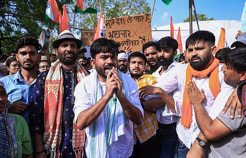 Jaipur: CJP leader Abhijeet Dipke along with party supporters stage a protest against Union Education Minister Dharmendra Pradhan over the alleged NEET-2026 examination paper leak, at Shaheed Smarak, in Jaipur, Rajasthan, Monday, June 15,