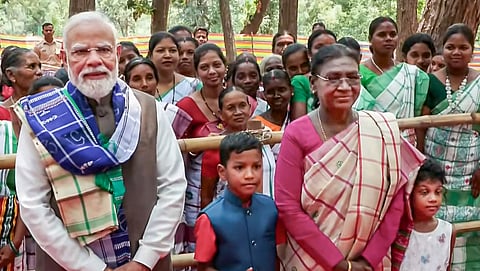 President Droupadi Murmu and Prime Minister Narendra Modi during their visit to the sacred groves Santhali Jahera and Ho Jahera, at Pahadpur