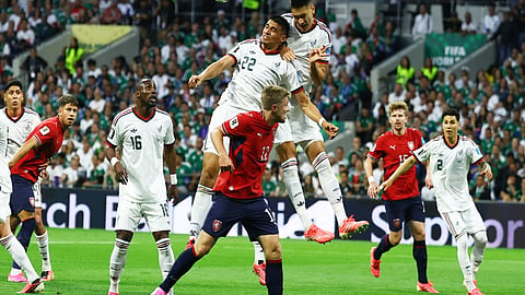 Mexico's Guillermo Martinez and Cesar Montes in action with Czech Republic's Lukas Cerv