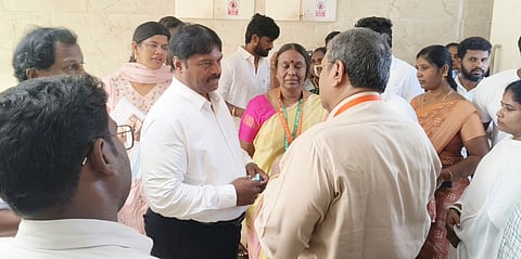 State Minister R Kumar speaking to doctors in the hospital where affected workers are admitted, on Wednesday