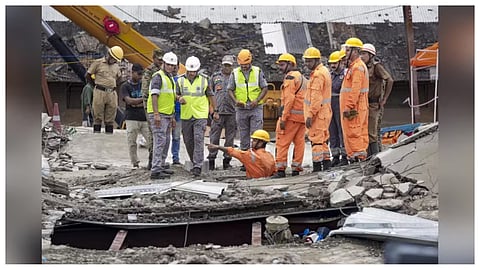Rescue personnel during the third day of search operation after an under-construction warehouse collapsed on Wednesday, leaving several injured and dead, in Kolkata's Taratala area