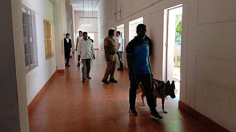 BDDS personnel scan the combined court premises in Karur on Monday