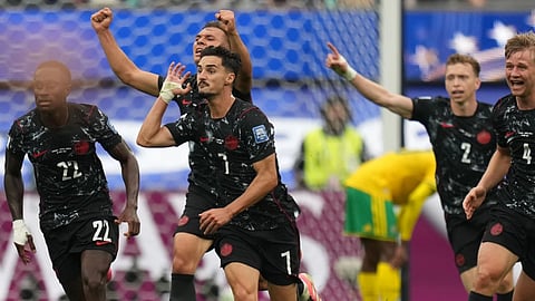 Canada's Stephen Eustaquio (7) celebrates scoring their opening goal against South Africa during the World Cup round of 32 soccer match in Inglewood, Calif., near Los Angeles