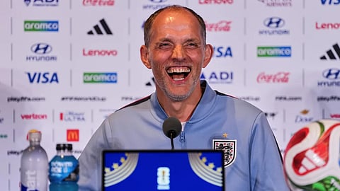 England head coach Thomas Tuchel laughs to the media during a press conference ahead of the World Cup Group L soccer match between England and Ghana in Foxborough, Mass